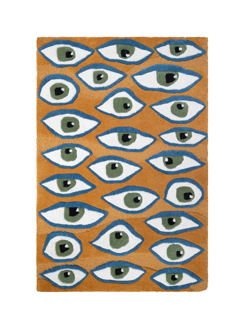 Alfombra rectangular Amuleto con patrón de ojos en colores azul, verde y blanco sobre fondo color mostaza.