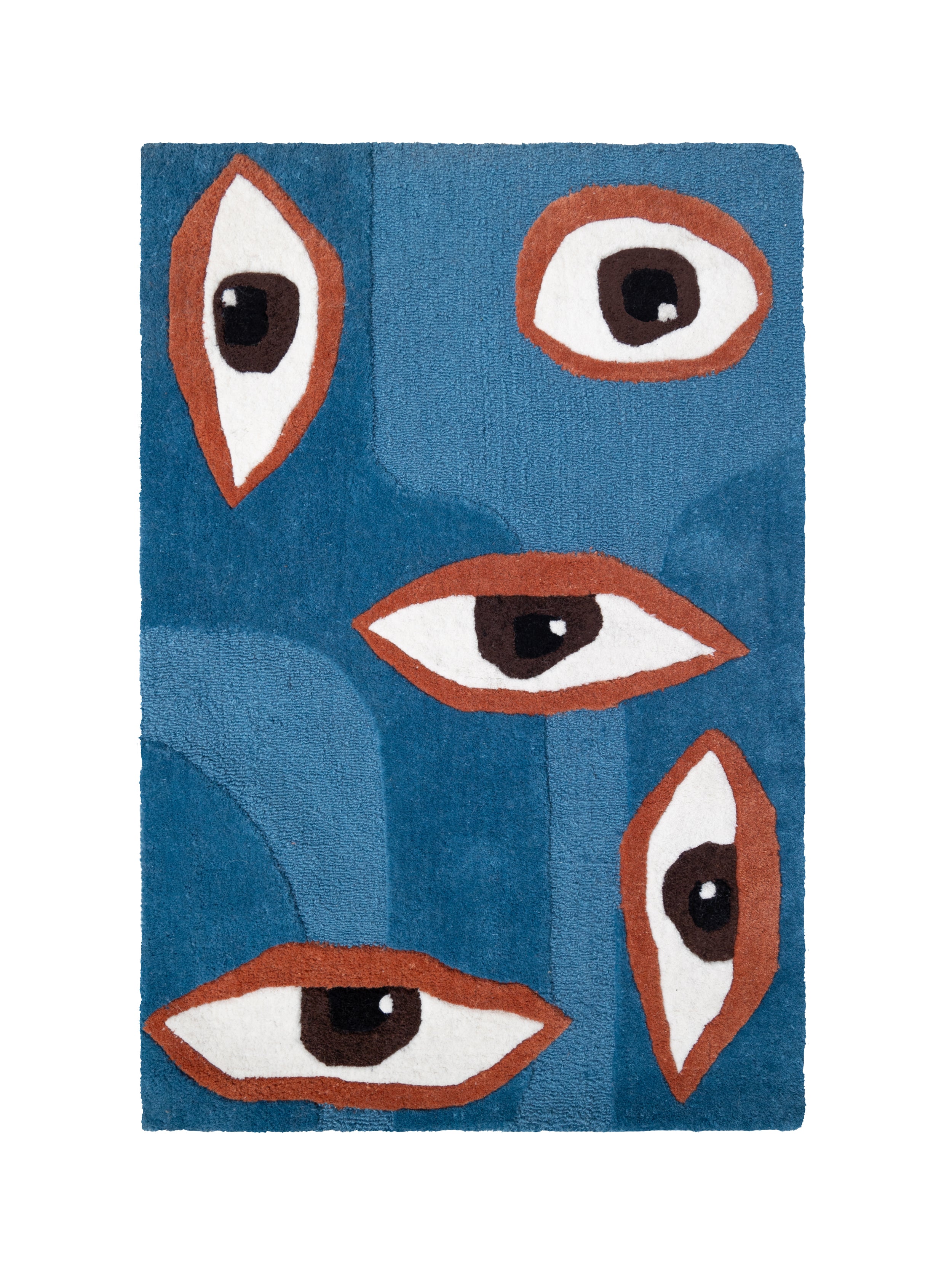 Alfombra rectangular Talismán con diseño de cinco ojos de diferentes tamaños sobre un fondo en dos tonos de azul.