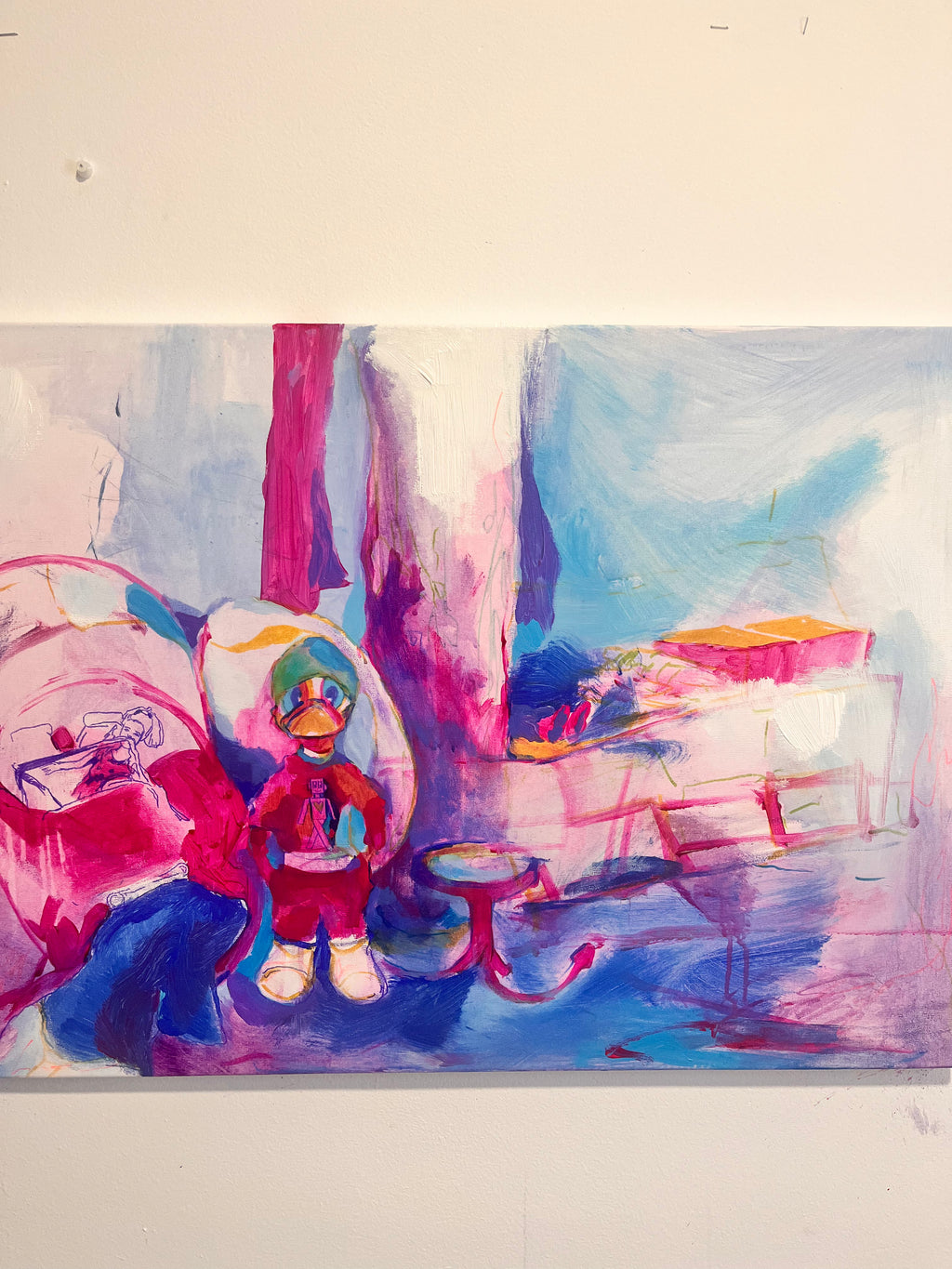 Vista del lienzo de 50x70 cm donde se aprecia el acabado lateral y la firma de la artista.
